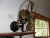 Photo of an antique GE pancake electric wall mount  fan