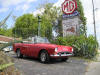 Photo of a Sunbeam Tiger and our sign