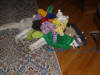 photo os a husky covered in toys